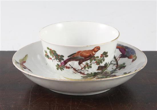 A Chelsea gold anchor petal moulded tea bowl and saucer, c.1765, 14cm, loss and restoration to saucer